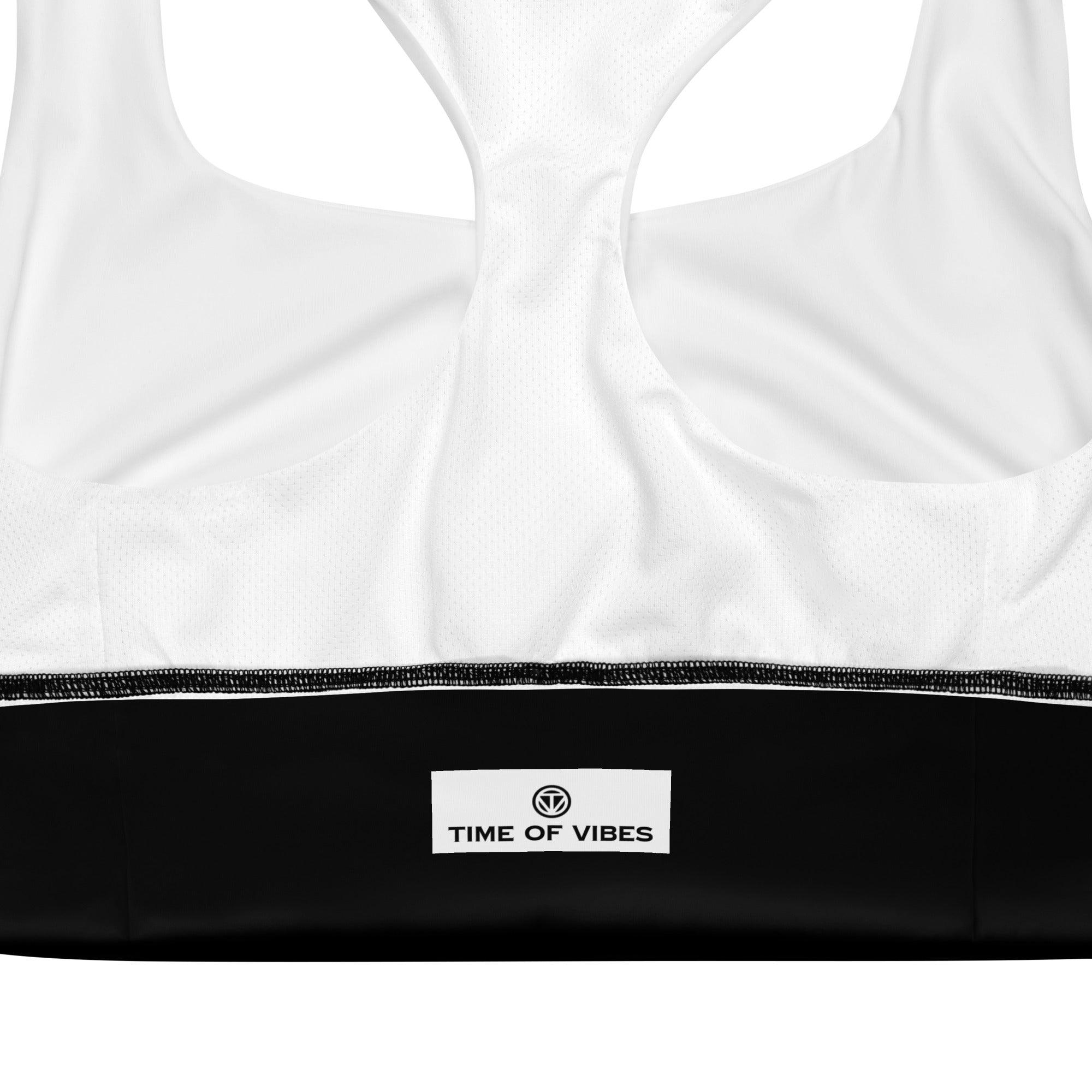 Weiß-schwarzer Sport-BH mit TIME OF VIBES Logo, Close-up Ansicht, atmungsaktives Material