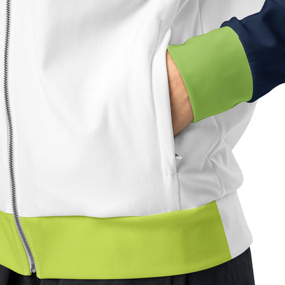 Person wearing white jacket with green and navy accents, pocket detail.